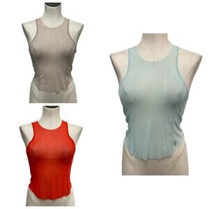 Free People Tank Tops in Beige, Light Blue, and Red